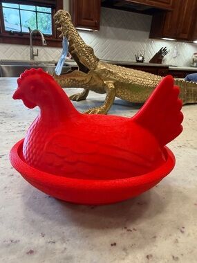 Bright Red Hen on a Nest